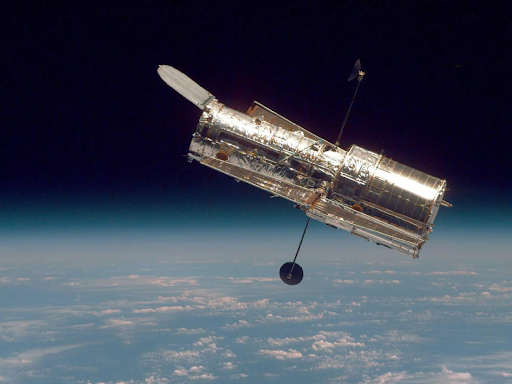 An image of Hubble above the Earth taken after its second servicing mission in 1997.
