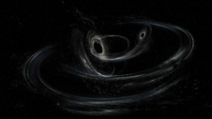 A Binary Black Hole Found Wobbling
