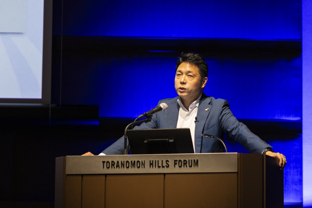 Astroscale founder Nobu Okada speaks at the 2024 Spacetide conference in Tokyo. Image: Spacetide.