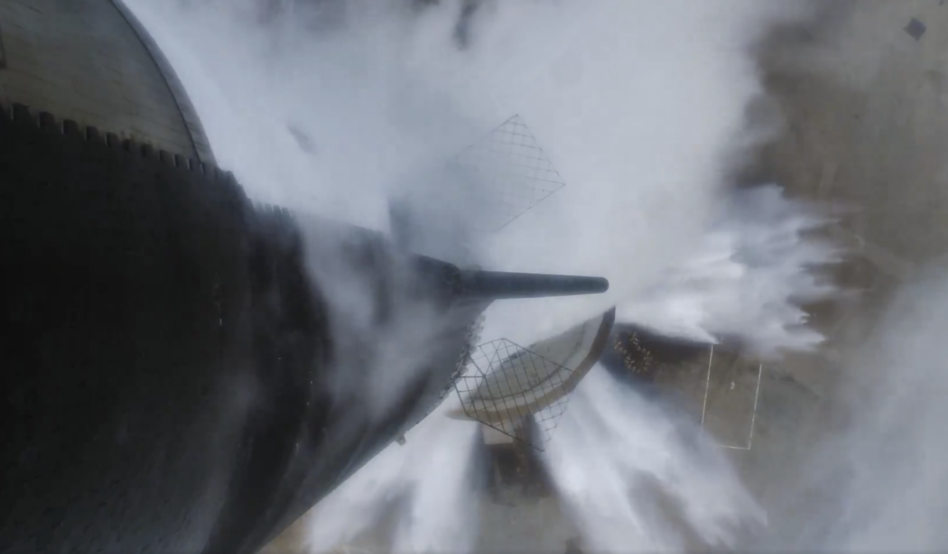 The water deluge system kicks in below Starship seconds before its fourth flight test. Image: SpaceX.