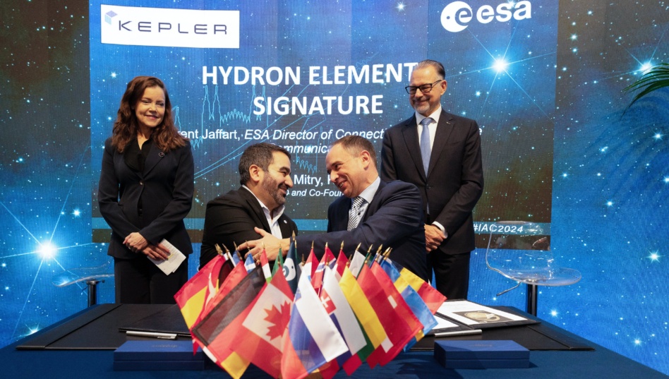 ESA Director of Connectivity and Secure Communications, Laurent Jaffart and Kepler Communications Inc. CEO and Co-Founder, Mina Mitry, shake hands following the signature at IAC 2024. Image credit: ESA/P.Sebirot